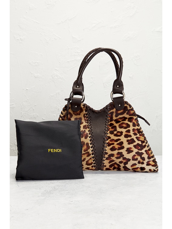 FWRD Renew Fendi Ponyhair Devil Trapezio Handbag in Tan | FWRD