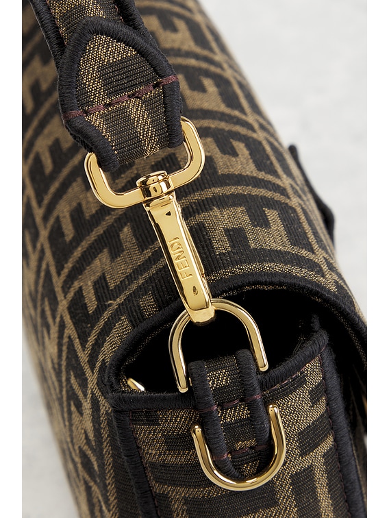 FWRD Renew Fendi FF 1974 Baguette Shoulder Bag in Tobacco Brown | FWRD