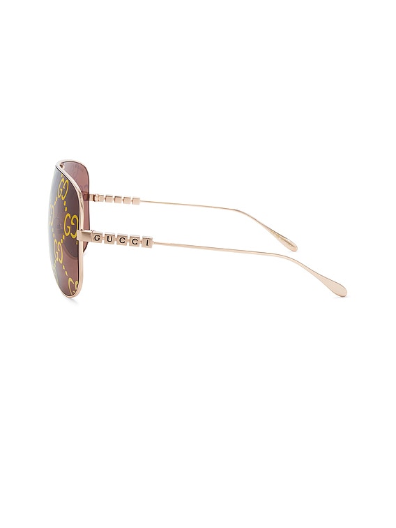 Gucci Lettering Mask Sunglasses in Gold & Red | FWRD