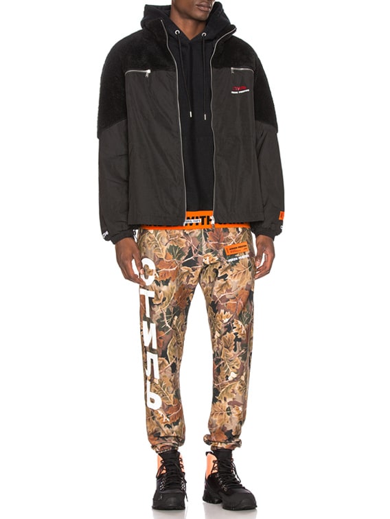 Heron Preston Handle With Care Hoodie in Black & Orange | FWRD