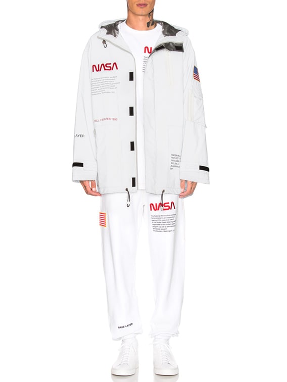 Heron Preston NASA High Tech Parka in White & Orange | FWRD