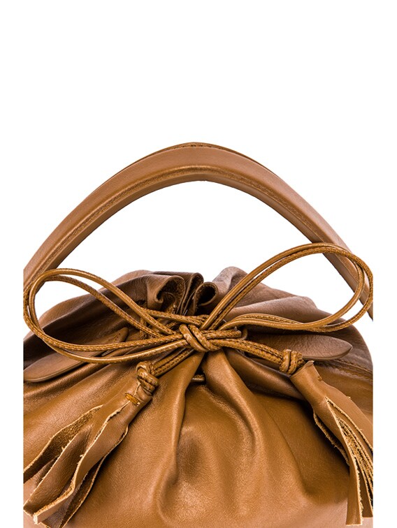 Jil Sander Small Drawstring Drum Bag in Tan | FWRD