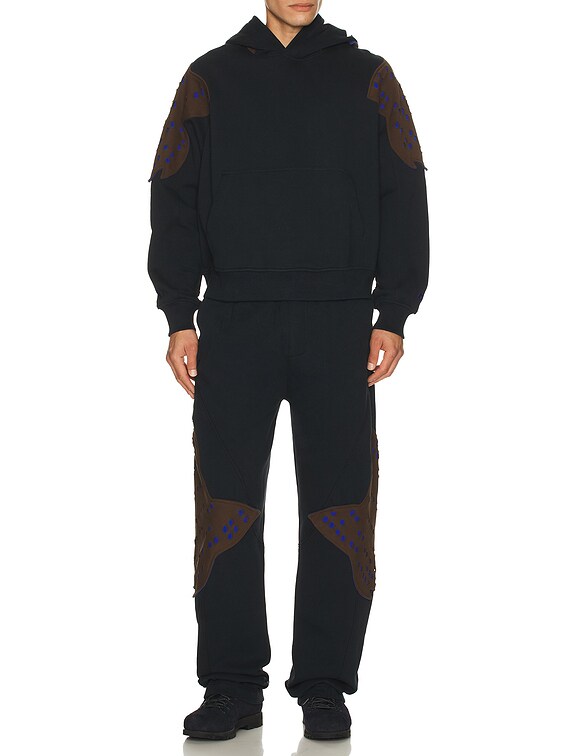Kiko Kostadinov Perforated Fleece Hoodie in Black Rinse | FWRD Kiko Kostadinov Perforated Fleece Hoodie in Black Rinse | FWRD