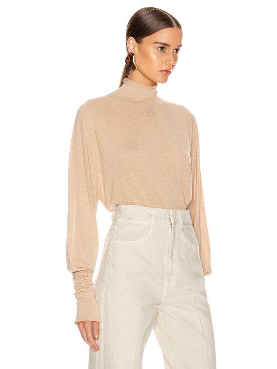 beige turtleneck top