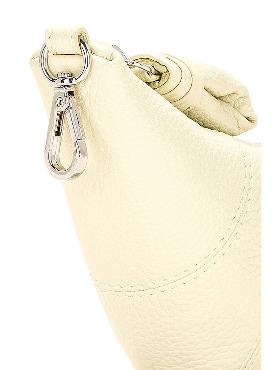 Lemaire Croissant Coin Purse Necklace in Dusty Yellow | FWRD