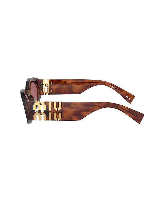Miu Miu Oval Sunglasses in Striped Tobacco | FWRD