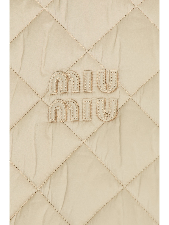 ダウンジャケット・コート MIU MIU DOWN JACKETS SABBIA Miu Miu Star Down Jacket in Bianco | FWRD