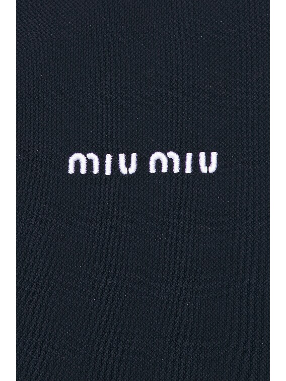 Miu Miu Short Sleeve Polo Top in Blue | FWRD