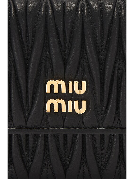 Miu Miu Matelasse Minuteria Bag in Nero | FWRD