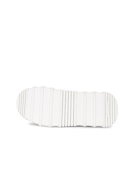 Miu Miu Logo Platform Sneakers in Nero | FWRD