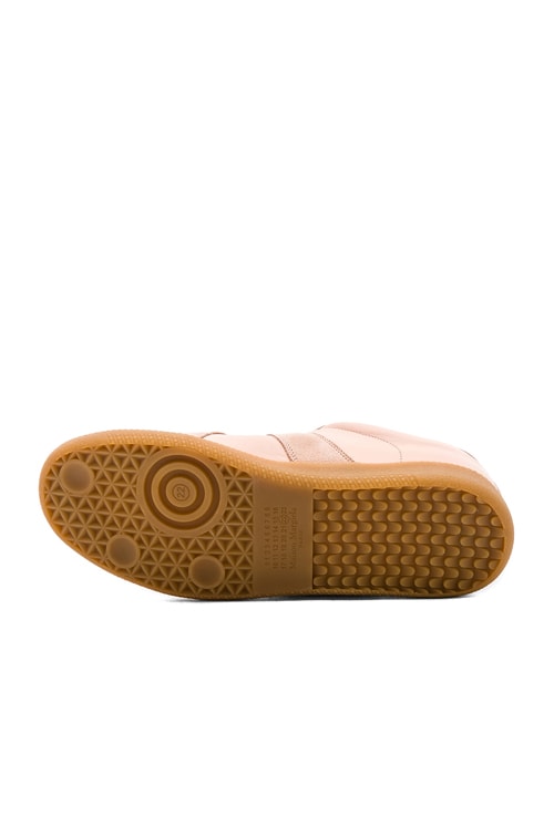 Maison Margiela Replica Low Top Sneakers in Nude | FWRD