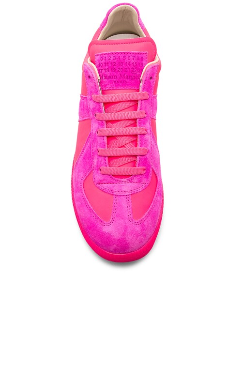 fluorescent pink sneakers