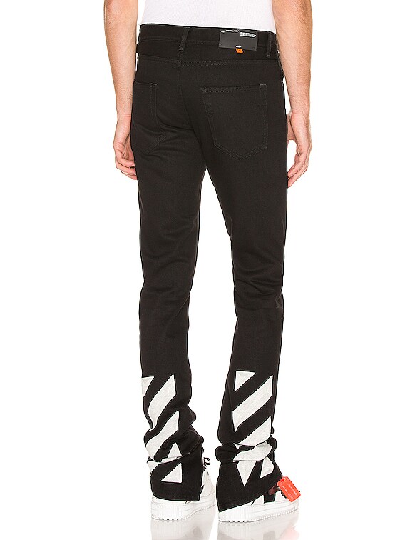 OFF-WHITE Slim Split Jeans in Black & White | FWRD
