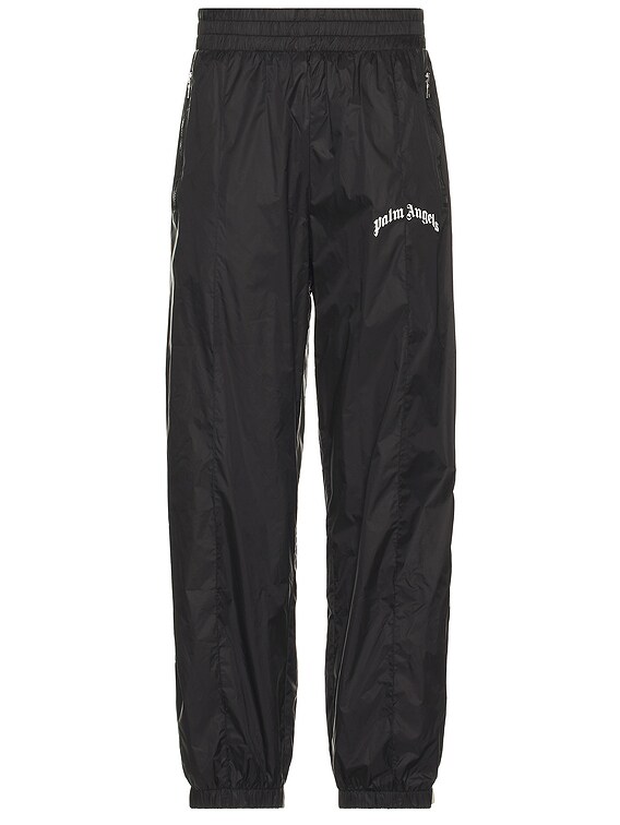 Palm Angels Curved Logo Nylon Track Pants in Black | FWRD Palm Angels Curved Logo Nylon Track Pants in Black | FWRD