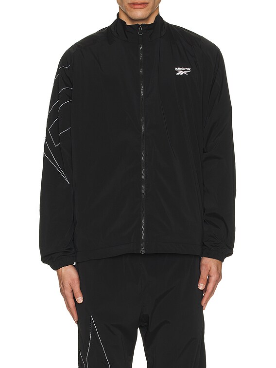 Reebok X Kanghyuk Stitched Logo Track Jacket in Dark Grey | FWRD
