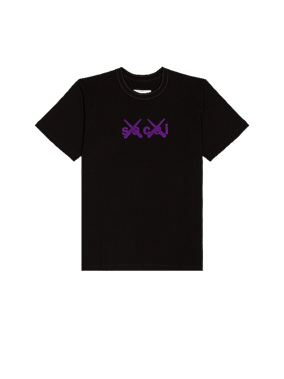 国内より1WEEK【sacai】Flock Print T-Shirt Sacai KAWS Flock Print T-Shirt in Black & Purple | FWRD