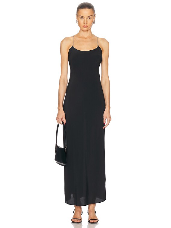 fine silk dress Fine satin silk forms this softly draped mini dress, accented with a statement bow and a flowing tail. Hand-made drapery flowers cascade in delicate strings, while the sleeves frame the neckline with