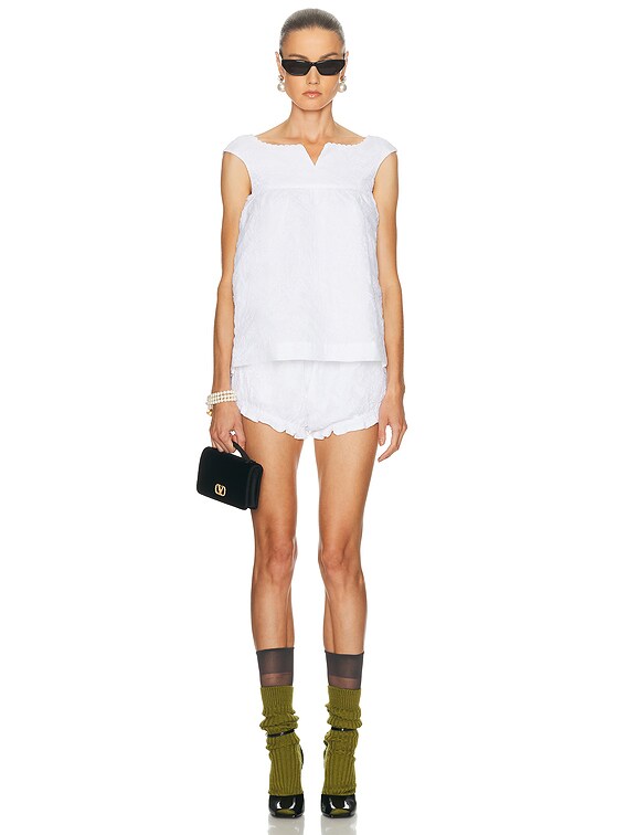 SHUSHU TONG ノースリーブ ポロシャツ ホワイト Shushu/Tong Notched Fluffy Sleeveless Top in White | FWRD