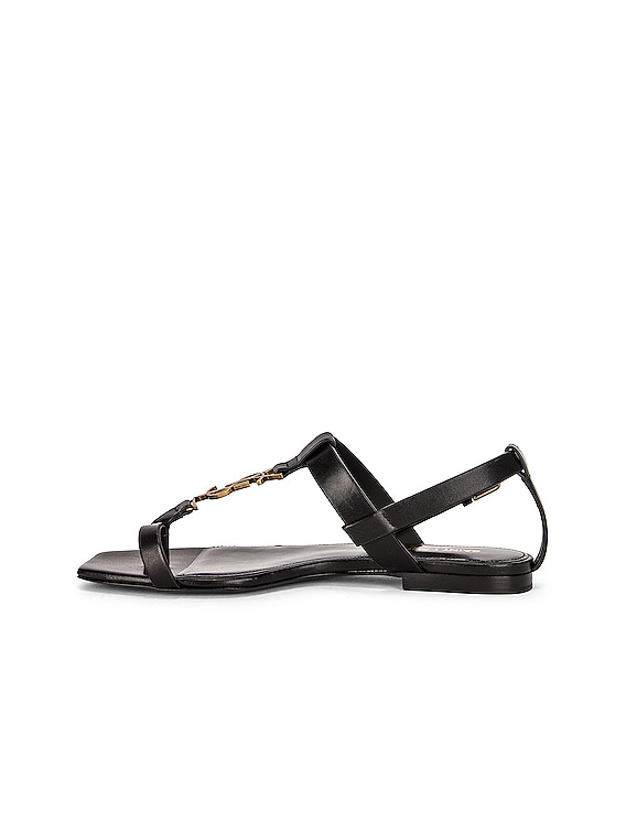 Saint Laurent Cassandra Flat Sandals in Nero | FWRD