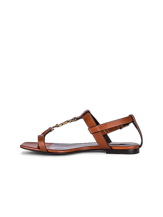 Saint Laurent Cassandra Flat Sandals in Caramel | FWRD