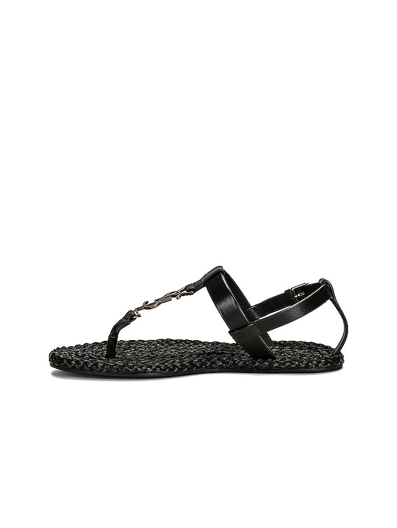 【Saint Laurent】送料/関税込 CASSANDRA FLAT SANDALS Saint Laurent Cassandra Leather Flat Sandals in Nero | FWRD