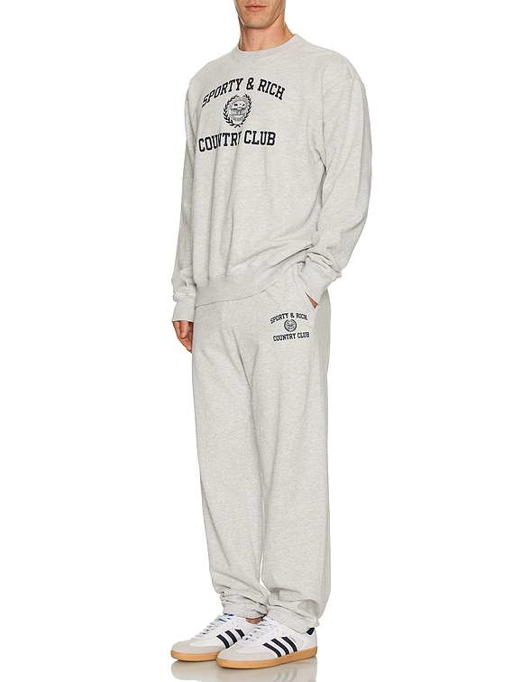 Sporty & Rich Varsity Crest Sweatpant in Heather Grey | FWRD