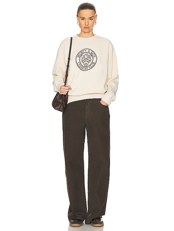 ★Sporty & Rich★ Connecticut Crest Sweatshirt Cream CRAW231 Sporty & Rich Connecticut Crest Crewneck Sweater in Cream | FWRD