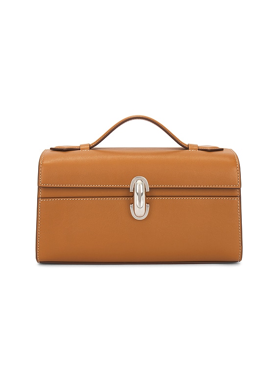 Savette The Symmetry Pochette Bag in Saddle | FWRD