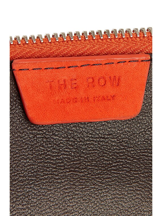 The Row Owen Pouch in Orange PLD FWRD