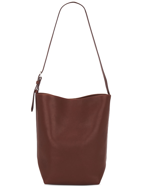 The Row Medium Park Tote Belt in New Burgundy | FWRD