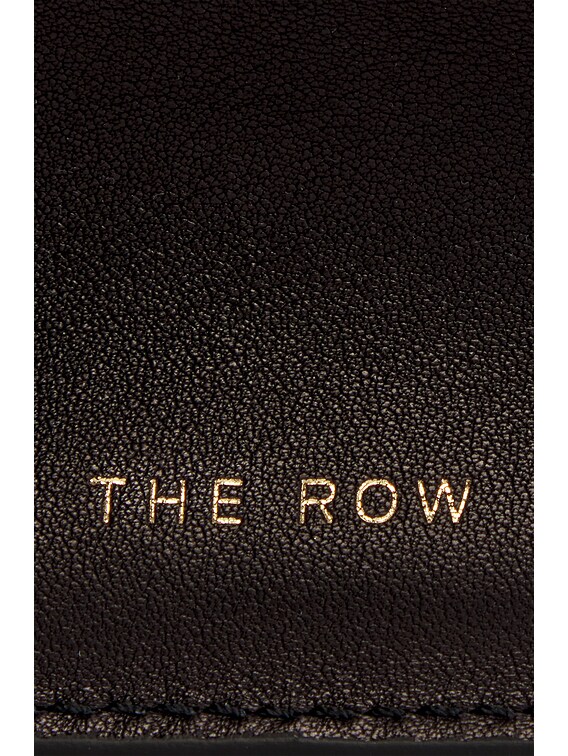 The Row Margaux EW Clutch in Black SHG | FWRD