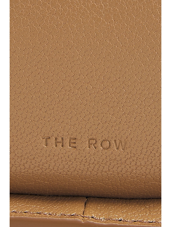 The Row Half Moon Bag in Warm Chestnut Light Gold | FWRD The Row Half Moon Bag in Warm Chestnut Light Gold | FWRD
