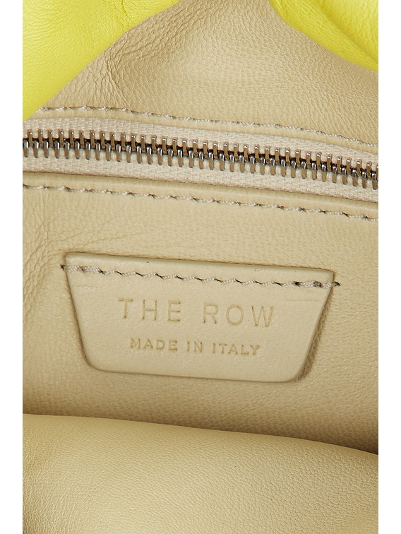 The Row Bourse Bag in Coppery Yellow Ans | FWRD
