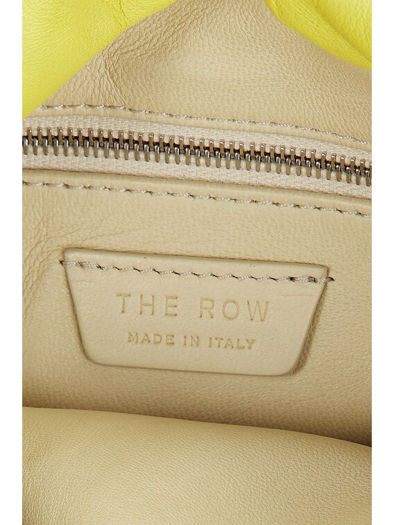 The Row Bourse Bag in Coppery Yellow Ans | FWRD