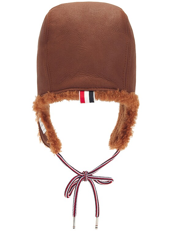 Thom Browne Dyed Shearling Tie Hat in Ginger | FWRD