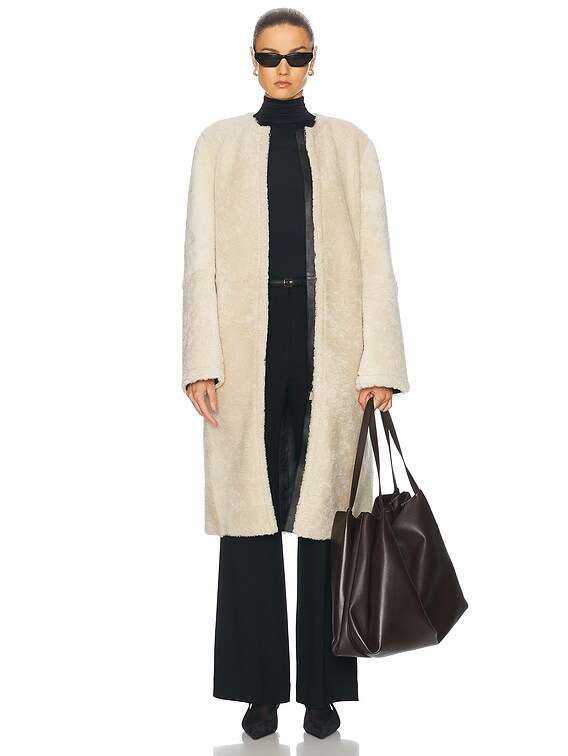 Toteme Zipped Teddy Shearling Coat in Cream | FWRD