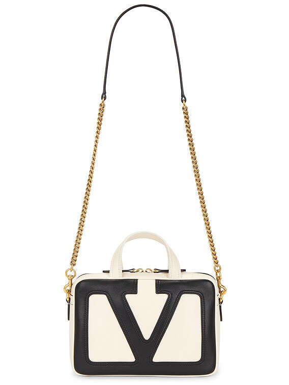 Valentino Garavani Viva Superstar Small Duffle Bag in Butter White