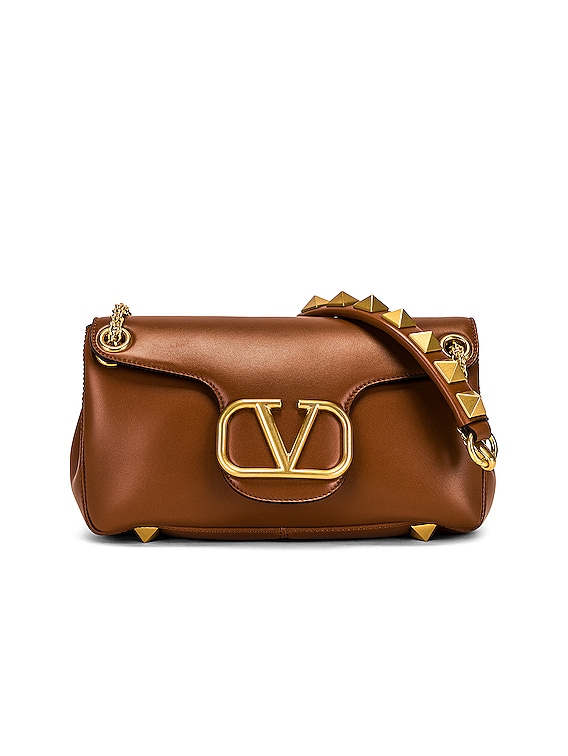 VALENTINO GARAVANI Stud Sign embellished leather shoulder bag in