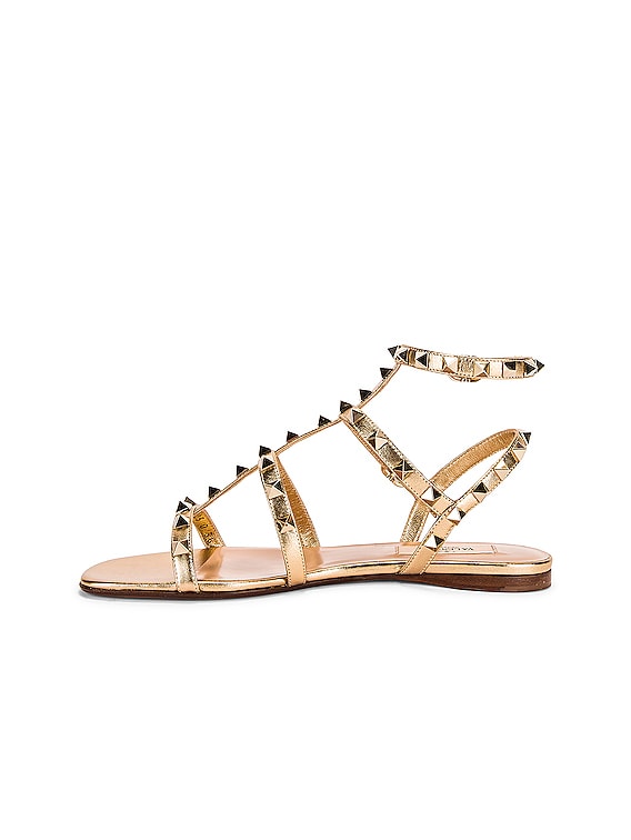 Valentino Garavani Rockstud Sandals in Star Gold | FWRD