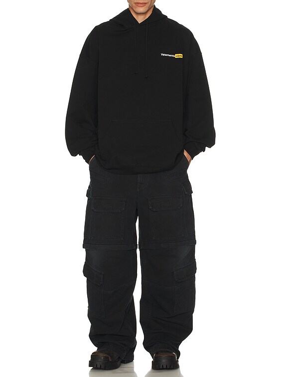 VETEMENTS VetementsCom Oversized Hoodie in Black | FWRD