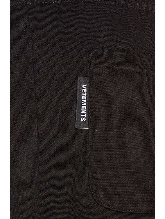 VETEMENTS Gothic Logo Sweatpants in Black | FWRD