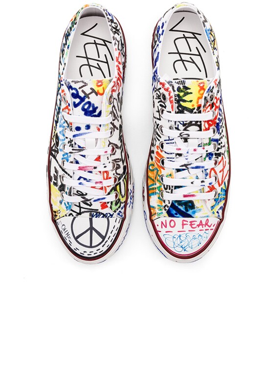 VETEMENTS Graffiti Low Tops in White | FWRD