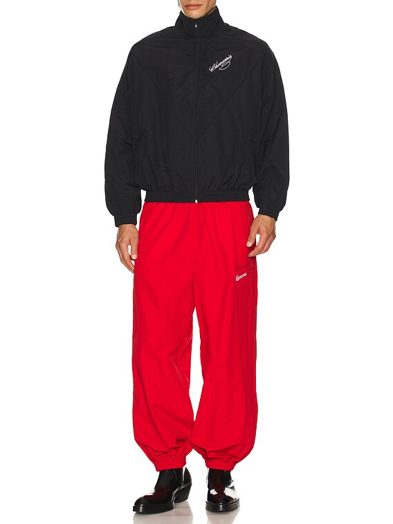 ウィリーチャバリア　 トラックパンツ ブラック レッド Willy Chavarria BAD BOY トラックパンツ - Red | FWRD
