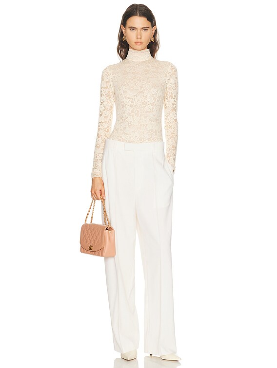Zimmermann High Neck Bodysuit in Cream | FWRD