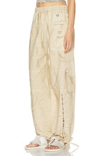 Acne Studios Pagino Baggy Cargo Trouser in Oat Beige, view 3, click to view large image.