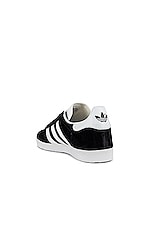 adidas Originals Gazelle Foundation Sneaker in Black & White & Gold Metallic, view 3, click to view large image.
