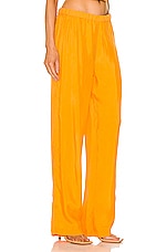 AEXAE Soft Touch High Rise Pant in Orange, view 2, click to view large image.