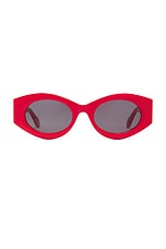 ALAÏA Oval Sunglasses in Red & Grey, view 1, click to view large image.