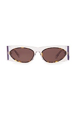 ALAÏA Oval Transparent Sunglasses in Crystal & Grey, view 1, click to view large image.