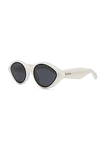 ALAÏA Lettering Logo Oval Sunglasses in White & Grey, view 2, click to view large image.